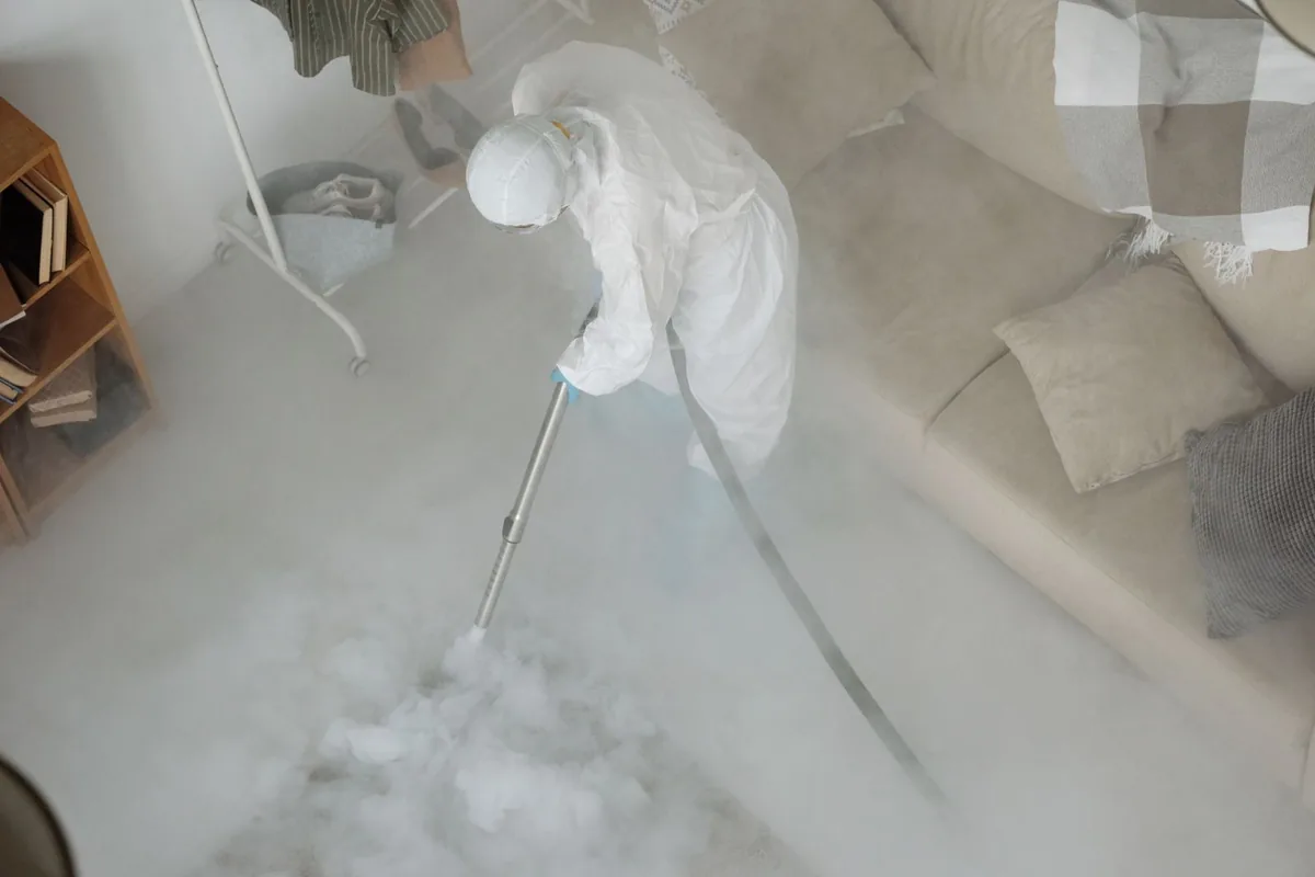 Biohazard cleanup technician in protective equipment, Richfield, OH